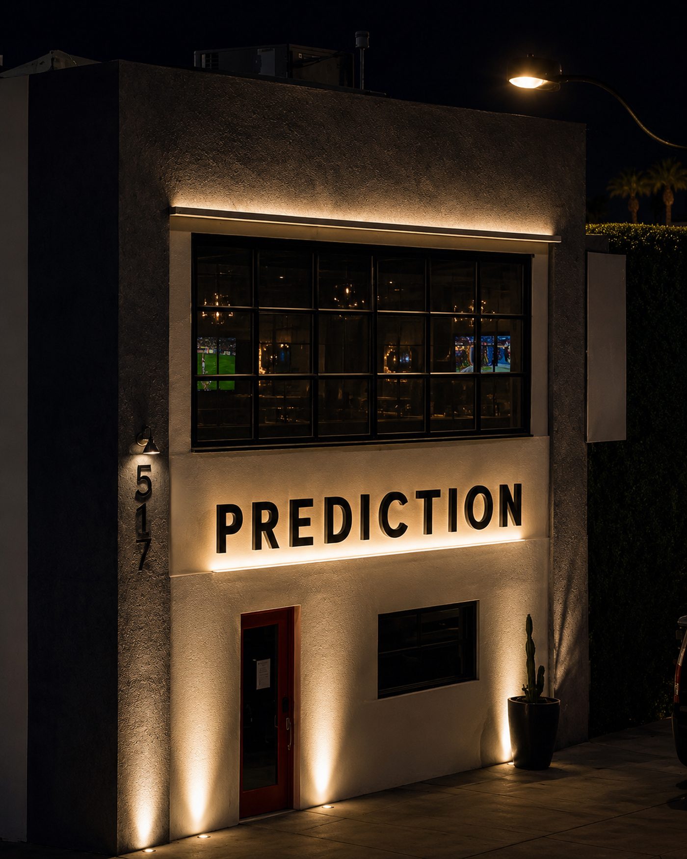 Prediction Vegas — the lounge exterior lit at night